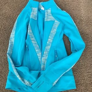 Girls size 12 Ivivva blue athletic sweater
